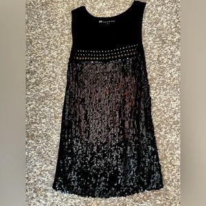 In great preloved condition (barely worn) Beautiful eye catching top